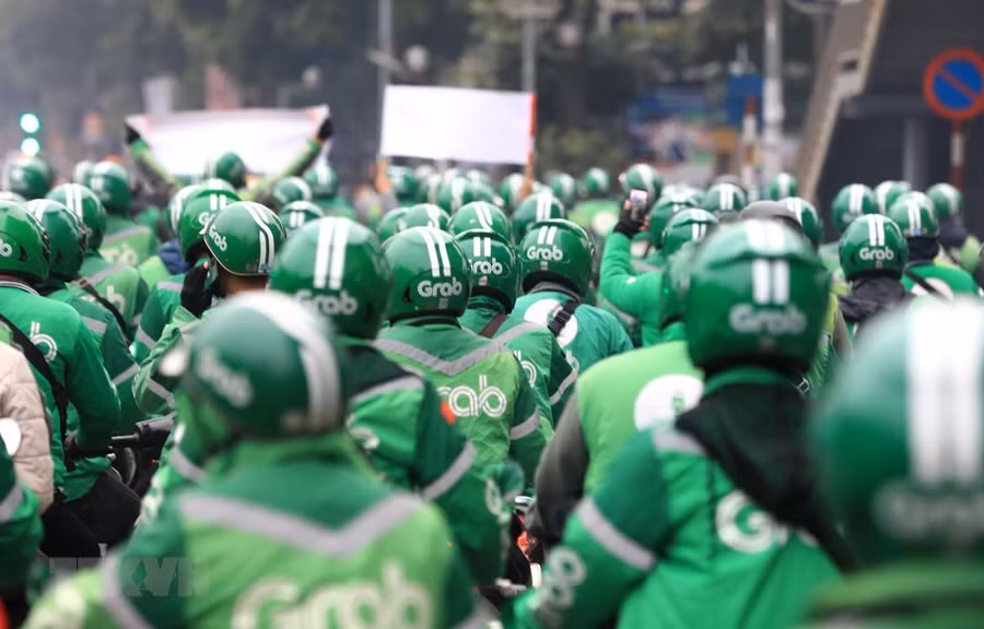 Tài xế Grab diễu hành. (Ảnh minh họa: Thành Đạt/TTXVN).