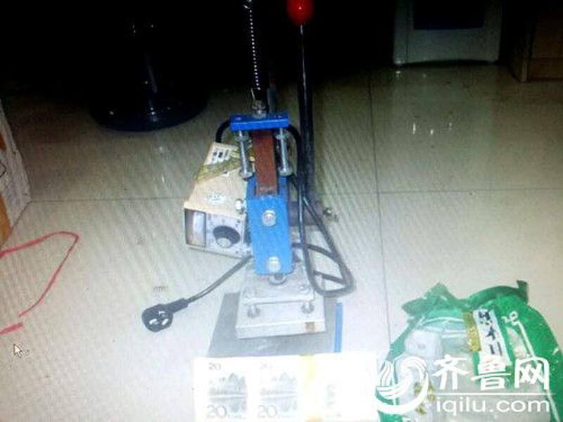 Trung Quốc phá băng nhóm làm tiền giả từ xì dầu ảnh 4