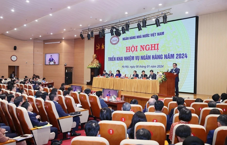 Thủ tướng Phạm Minh Chính phát biểu chỉ đạo tại Hội nghị triển khai nhiệm vụ ngành Ngân hàng. (Ảnh: Dương Giang/TTXVN) Thủ tướng Phạm Minh Chính phát biểu chỉ đạo tại Hội nghị triển khai nhiệm vụ ngành Ngân hàng. (Ảnh: Dương Giang/TTXVN)