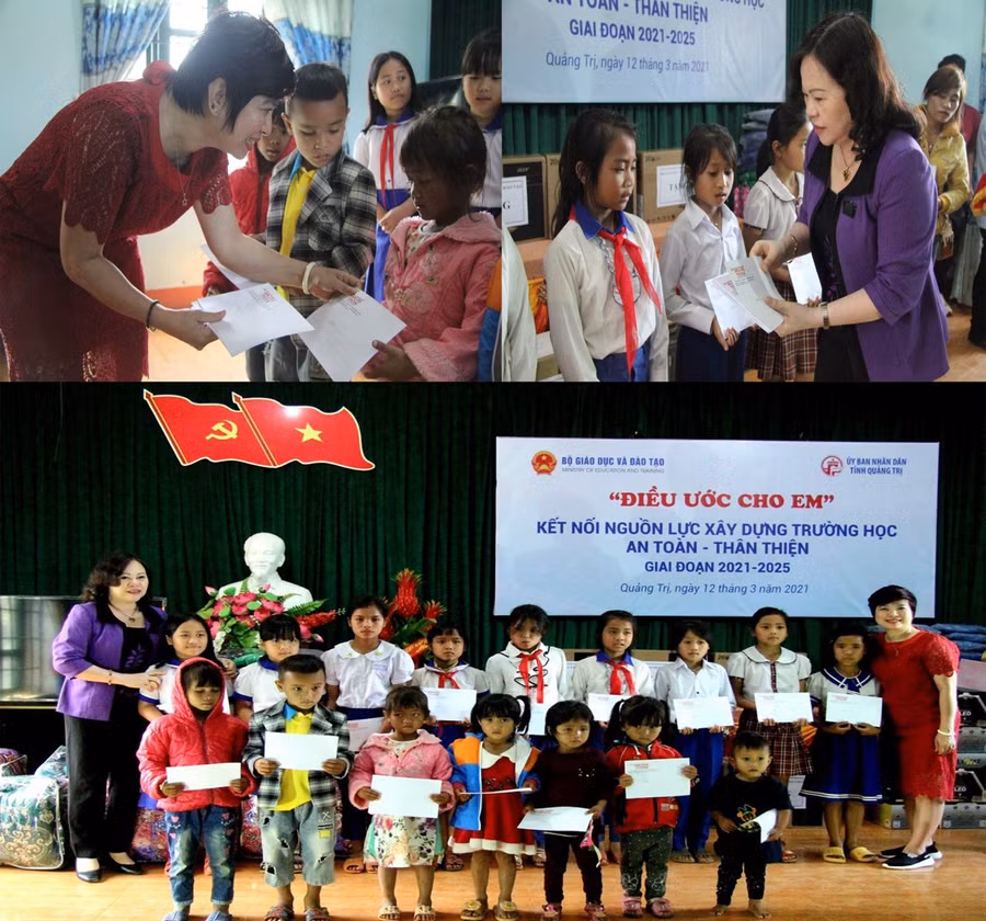 Thứ trưởng Ngô Thị Minh và nhà báo Dương Thanh Hương, Phó Tổng biên tập Báo GD&amp;TĐ trao quà cho các em học sinh tại Trường Tiểu học Hướng Phùng.