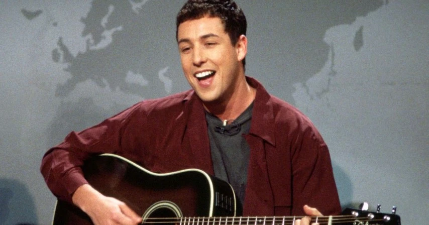 Adam Sandler trong phim “Saturday Night Live”, bộ phim làm nên tên tuổi của anh.