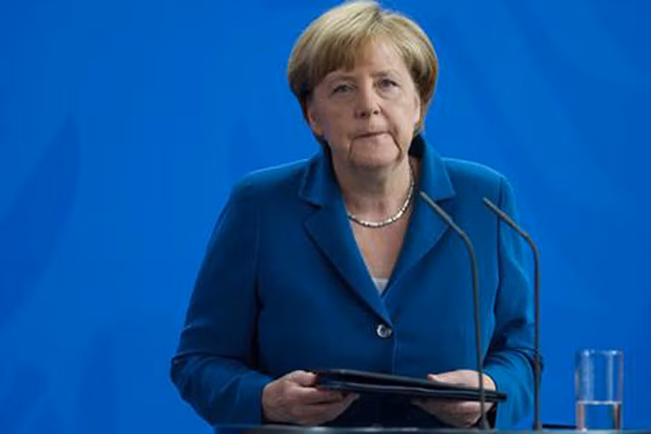 Bà Angela Merkel phát biểu tại Phủ Thủ tướng hôm qua. Ảnh: Reuters