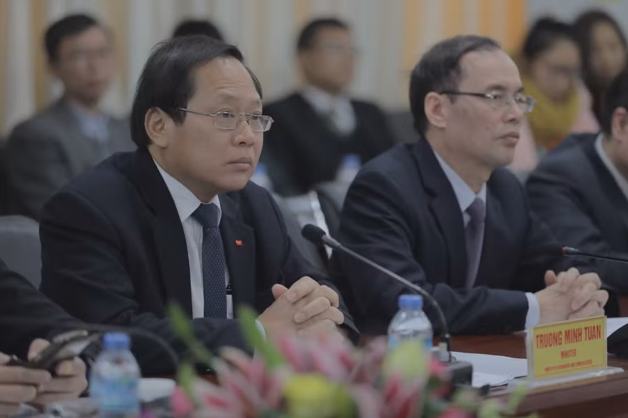 Bộ trưởng Bộ Thông tin và Truyền thông Trương Minh Tuấn dự lễ ký kết tại Học việc Công nghệ Bưu chính Viễn thông