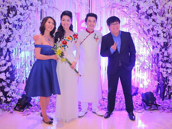 Vợ chồng Gia Bảo - Thanh Hiền mặc ton-sur-ton đi tiệc. 14_1420028010.jpg