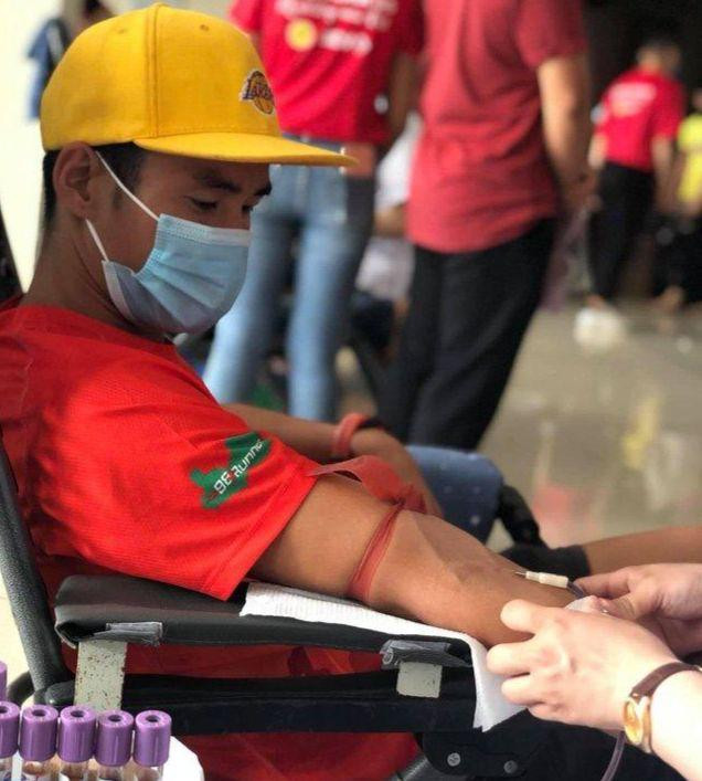 Vận động viên Phạm Tiến Sản trong một chương trình hiến máu tình nguyện. Ảnh: NVCC Vận động viên Phạm Tiến Sản trong một chương trình hiến máu tình nguyện. Ảnh: NVCC