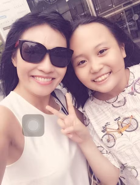 Phuong Thanh bat ngo cong khai hinh anh con gai sau 10 nam giau kin - Anh 1