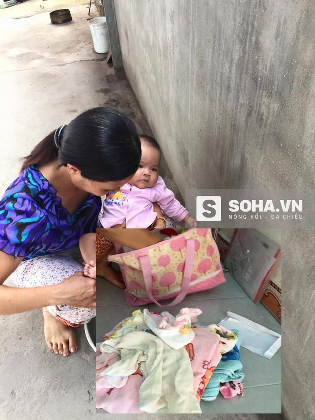  Bé gái 3 tuổi đang được chị Mai chăm sóc (Ảnh: Hoàng Long) 