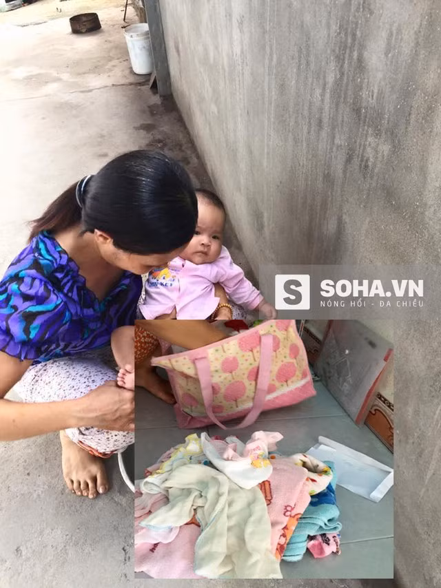  Bé gái 3 tuổi đang được chị Mai chăm sóc (Ảnh: Hoàng Long) 