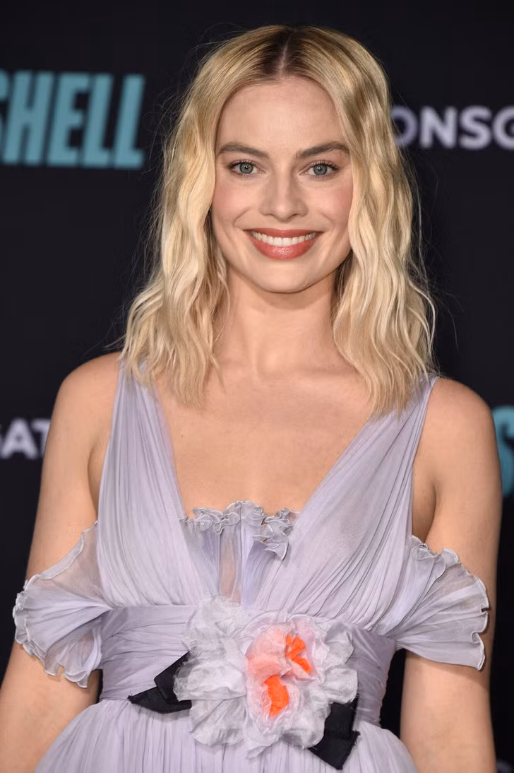Margot Robbie sẽ là một nghệ sĩ hát rong nếu cô ấy không tham gia sự nghiệp diễn xuất.