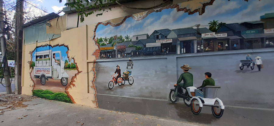 Góc phố được hoàn thành với 2 bức tranh khiến nhiều người dân Cần Thơ trầm trồ, khen ngợi.