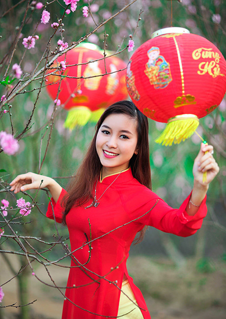Ngắm vẻ đẹp rạng rỡ của thiếu nữ Hà Nội cùng đào xuân ảnh 4 Thùy Chi đam mê du lịch và có sở trường nấu ăn.