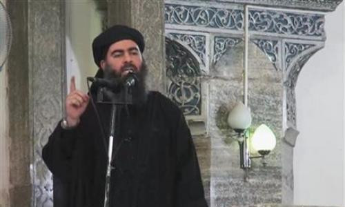 Abu Bakr al-Baghdadi, thủ lĩnh lực lượng Nhà nước Hồi giáo. Ảnh: AP. Abu Bakr al-Baghdadi, kẻ được cho là thủ lĩnh lực lượng phiến quân Hồi giáo ISIS. Ảnh: AP.