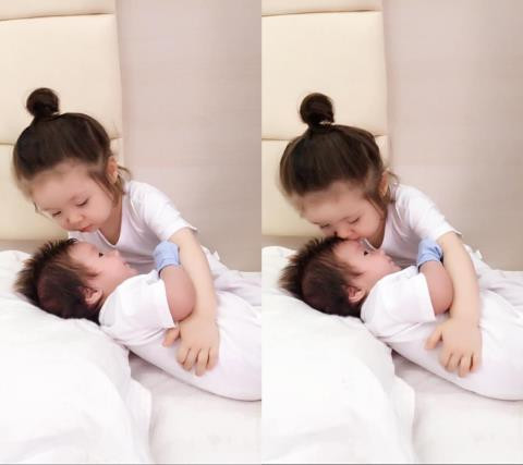 Loạt ảnh Elly Trần lộ bụng trước khi sinh con thứ hai