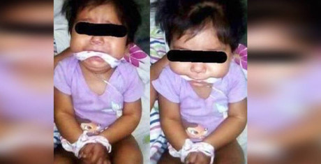 Bé gái 9 tháng bị bạn mẹ trói tay, nhét giẻ vào miệng cho... vui - Ảnh 1 Be gai 9 thang bi ban me troi tay, nhet gie vao mieng cho... vui - Anh 1