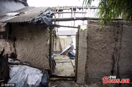 Trung Quoc: Dan dung bia mo co tram nam de xay nha - Anh 3