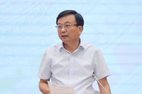 Ông Nguyễn Danh Huy - Thứ trưởng Bộ Xây dựng trả lời tại họp báo.