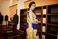 Ngọc Hân trong một thiết kế áo dài in họa tiết ruộng bậc thang độc đáo của NTK Xuân Lê.