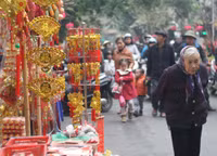 Chùm ảnh: Chợ hoa nổi tiếng nhất Hà Nội ngày giáp Tết - Ảnh 6