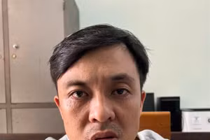 Đối tượng Trần Ngọc Ánh tại cơ quan công an. Ảnh: TG