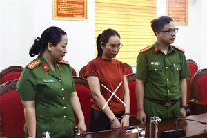 Ảnh: Vũ Thị Thúy tại cơ quan điều tra.
