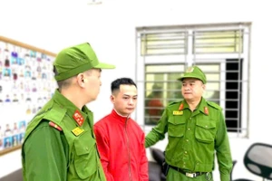 Nguyễn Hữu Bằng tại cơ quan công an.(Ảnh: CAHN).