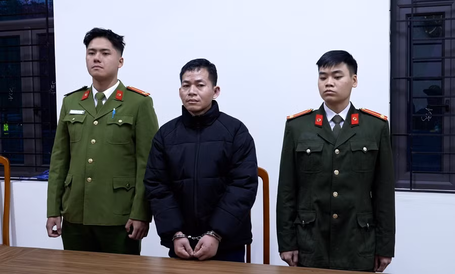 Bị can Trần Quốc Tín tại cơ quan công an.