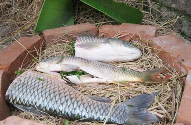 Cá nướng úp thau là cách chế biến có từ lâu đời.