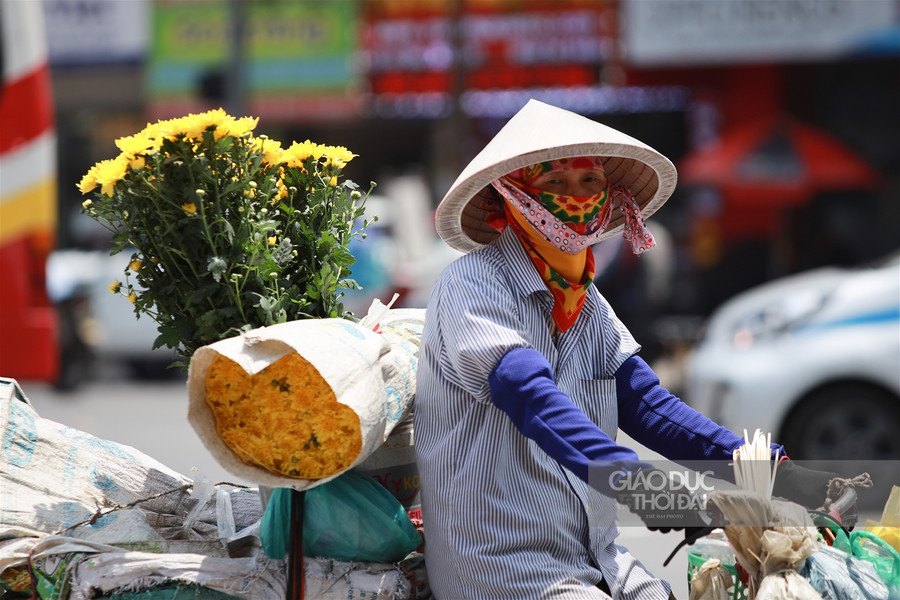 Muôn kiểu chống nắng khi Hà Nội 40 độ C ảnh 11