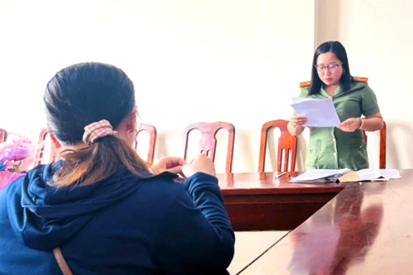 Bà T làm việc với cơ quan chức năng.