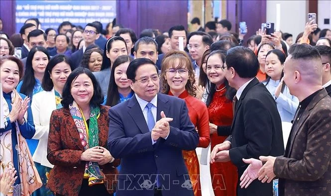 Thủ tướng Phạm Minh Chính dự Hội nghị tổng kết đề án hỗ trợ phụ nữ khởi nghiệp và biểu dương điển hình hợp tác xã do phụ nữ tham gia quản lý năm 2025. Ảnh: Dương Giang/TTXVN 