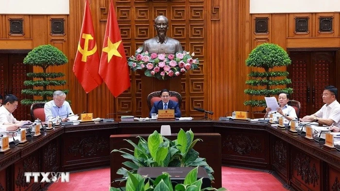 Thủ tướng Phạm Minh Chính chủ trì cuộc họp với các bộ, ngành để chuẩn bị đàm phán thương mại với Hoa Kỳ. (Ảnh: Dương Giang/TTXVN)