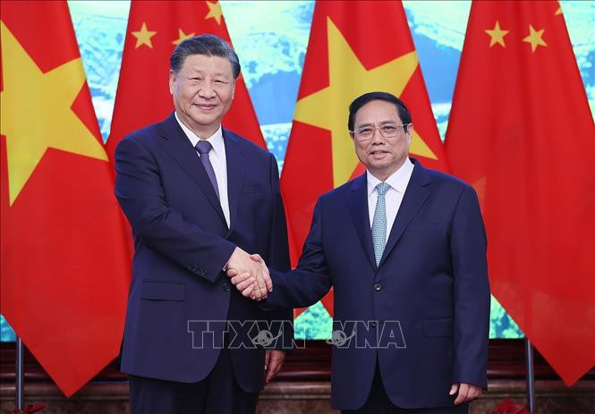 Thủ tướng Phạm Minh Chính và Tổng Bí thư, Chủ tịch nước Trung Quốc Tập Cận Bình chụp ảnh chung. Ảnh: Dương Giang/TTXVN Thủ tướng Phạm Minh Chính và Tổng Bí thư, Chủ tịch nước Trung Quốc Tập Cận Bình chụp ảnh chung. Ảnh: Dương Giang/TTXVN