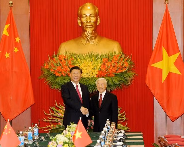 Tổng Bí thư Nguyễn Phú Trọng đón và hội đàm với Tổng Bí thư, Chủ tịch Trung Quốc Tập Cận Bình trong chuyến thăm cấp Nhà nước tới Việt Nam năm 2017. Ảnh: VGP Tổng Bí thư Nguyễn Phú Trọng đón và hội đàm với Tổng Bí thư, Chủ tịch Trung Quốc Tập Cận Bình trong chuyến thăm cấp Nhà nước tới Việt Nam năm 2017. Ảnh: VGP