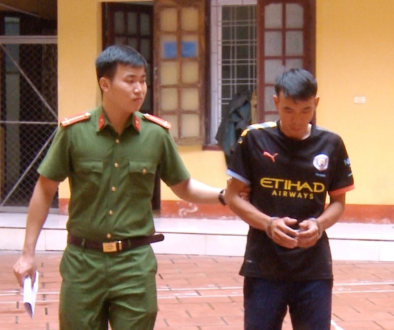 Nguyễn Văn Bằng bị áp giải về cơ quan công an. Ảnh: Công an Thanh Hóa cung cấp. Nguyễn Văn Bằng bị áp giải về cơ quan công an. Ảnh: Công an Thanh Hóa cung cấp.