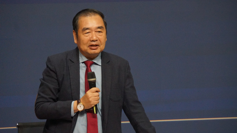 PGS.TS Lê Vũ Nam, Phó Hiệu trưởng Trường Đại học Kinh tế - Luật (Đại học Quốc gia TPHCM) phát biểu tại hội thảo. Ảnh: Mạnh Tùng