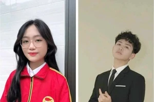 Em Nguyễn Thị Cẩm Tú (bên phải) và em Hà Thanh Phúc cùng đoạt Huy chương Bạc kỳ thi Olympic Sinh học Hoa Kỳ.
