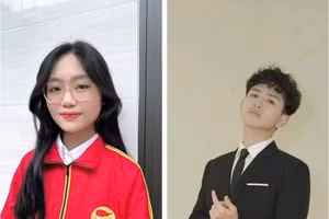 Em Nguyễn Thị Cẩm Tú (bên phải) và em Hà Thanh Phúc cùng đoạt Huy chương Bạc kỳ thi Olympic Sinh học Hoa Kỳ.