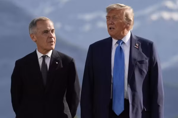 Thủ tướng Canada Mark Carney và Tổng thống Mỹ Donald Trump.