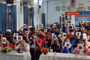 Thiếu nhi phường Phước Bình sôi nổi tham gia cuộc thi Rung chuông vàng, tìm hiểu Luật Giao thông sáng 14/7.