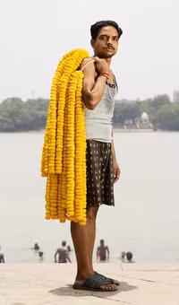 Những người đàn ông bán hoa ở Ấn Độ ảnh 5