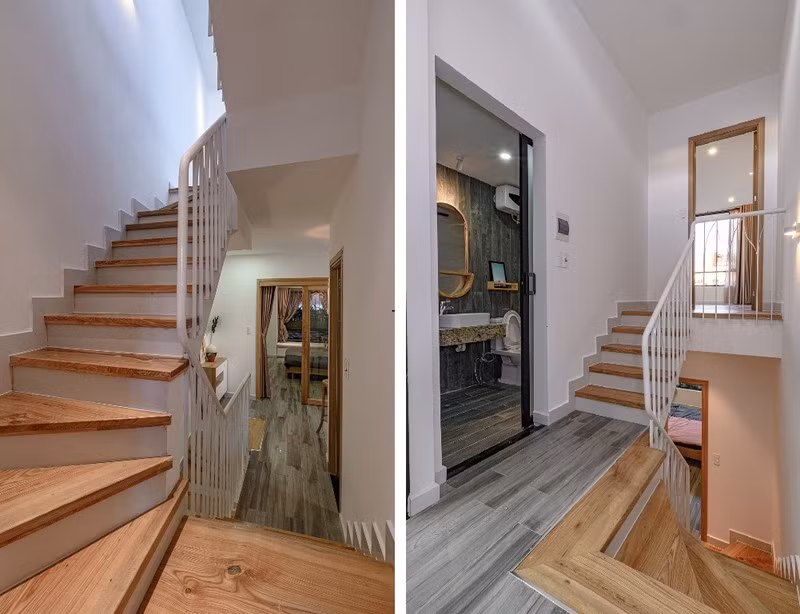 Cầu thang gỗ dẫn lên các tầng khác.