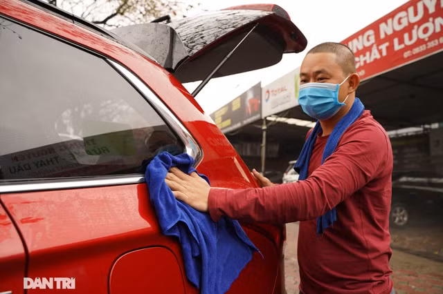 Dịch vụ rửa xe ở Hà Nội hốt bạc dịp Tết Nguyên đán, giá tăng cao gấp 4 lần - 5