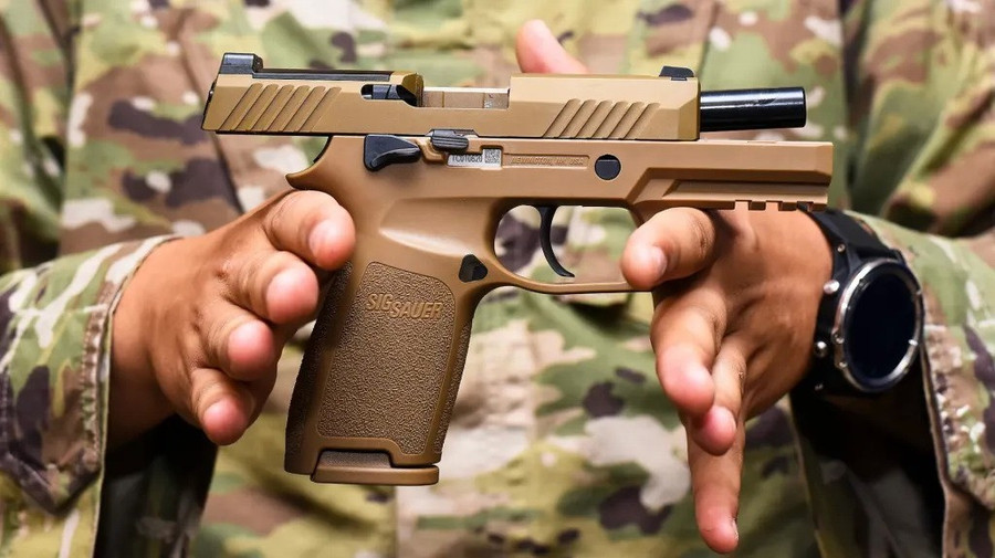 Súng ngắn SIG Sauer M18 đang phải chịu khá nhiều tai tiếng. 7996887f4abe91c2.jpg