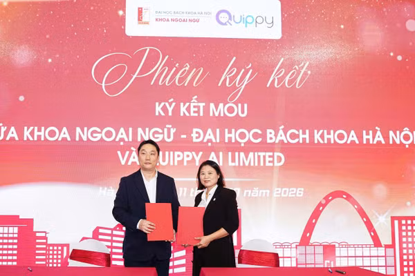 Ông Jerry Yiu, Nhà sáng lập kiêm CEO Quippy AI Limited (trái) và bà Trịnh Thị Ánh Hằng, Trưởng khoa Ngoại ngữ - Đại học Bách khoa Hà Nội ký kết biên bản ghi nhớ hợp tác.
