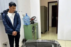 Thành cùng tang vật tại thời điểm bị bắt giữ.