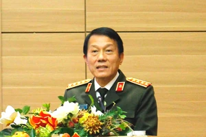 Bộ trưởng Bộ Công an Lương Tam Quang phát biểu tại hội nghị.