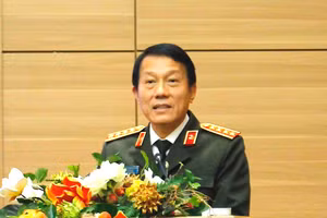 Bộ trưởng Bộ Công an Lương Tam Quang phát biểu tại hội nghị.