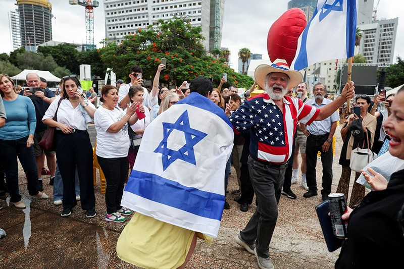 chum-anh-nguoi-dan-israel-va-gaza-an-mung-sau-lenh-ngung-ban-014.jpg