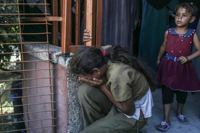 chum-anh-israel-tan-cong-tren-bo-thanh-pho-gaza-0905-11.jpg