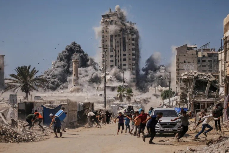 chum-anh-israel-tan-cong-tren-bo-thanh-pho-gaza-0905-14.jpg